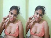 Horny Bhabhi Showing Her Boobs and Masturbating Part 2